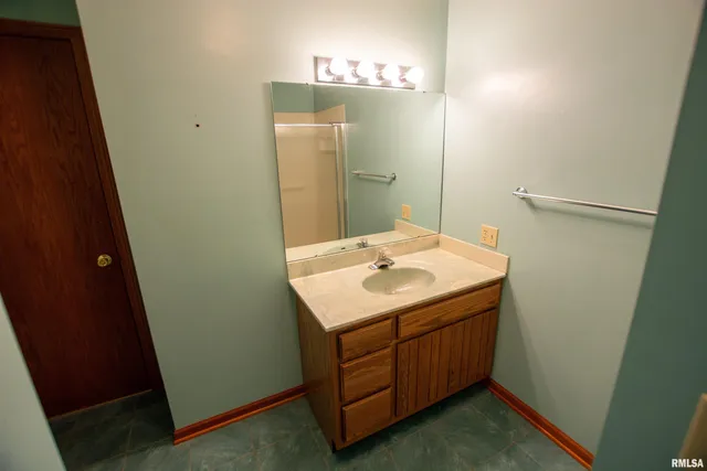 $300,000 | 591 Breezy Point Drive, Clinton, IA 52732