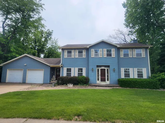 $300,000 | 591 Breezy Point Drive, Clinton, IA 52732