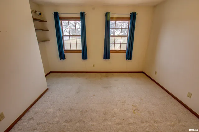 $300,000 | 591 Breezy Point Drive, Clinton, IA 52732