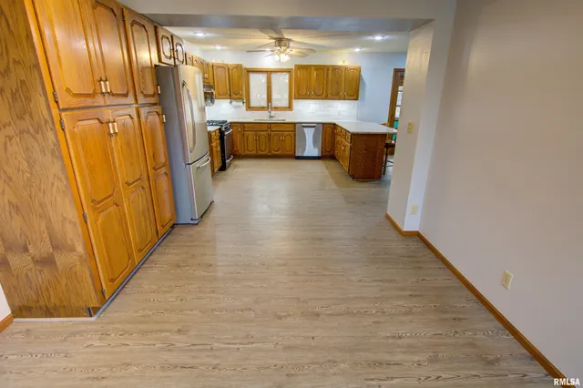 $300,000 | 591 Breezy Point Drive, Clinton, IA 52732