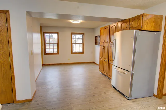 $300,000 | 591 Breezy Point Drive, Clinton, IA 52732