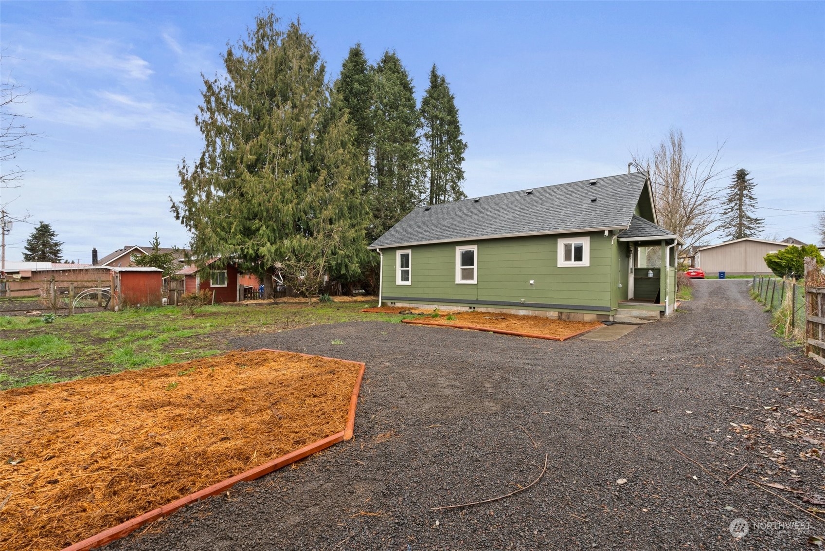 325 East Main Mossyrock, WA 98564 - Photo 19 of 24 a view of an house with backyard space and tree s