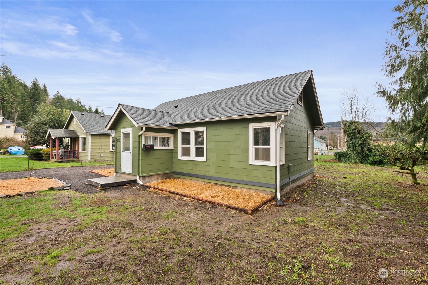 325 East Main Mossyrock, WA 98564 - Photo 22 of 24 a view of a house with backyard and garden
