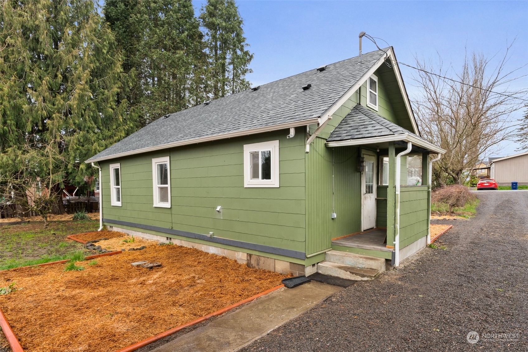 325 East Main Mossyrock, WA 98564 - Photo 23 of 24 a view of a house with wooden fence