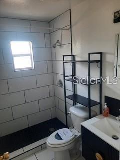 2802 Banza Street, Unit A Tampa, FL 33605 - Photo 5 of 7 a bathroom with a toilet and a shower