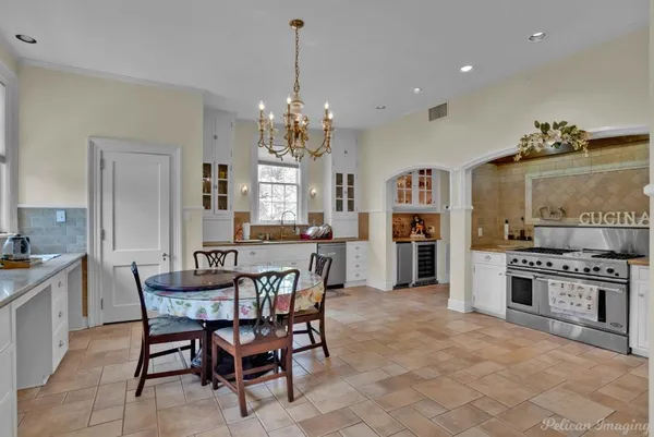 a view of a dining room kitchen and a window