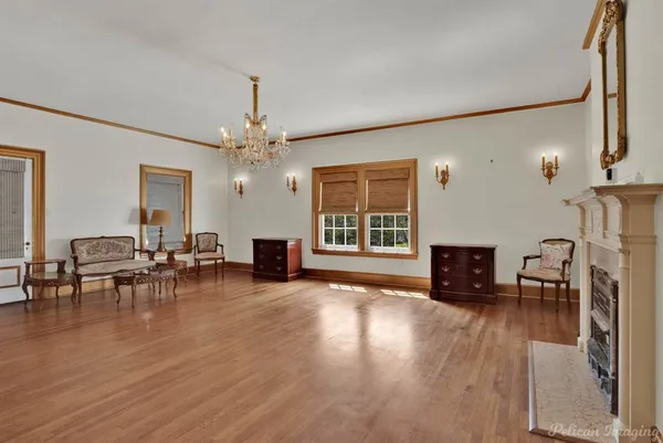 a view of a livingroom with furniture and a flat screen tv