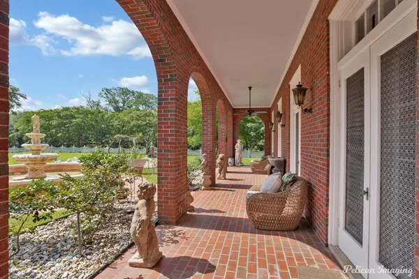 a view of a balcony with couch