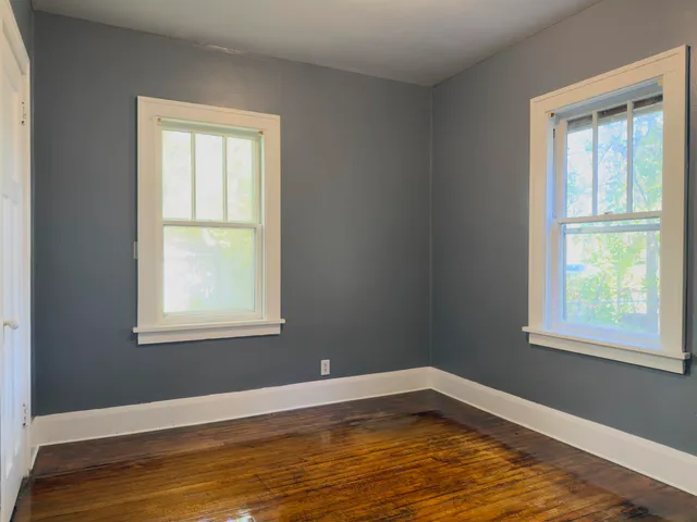 an empty room with window