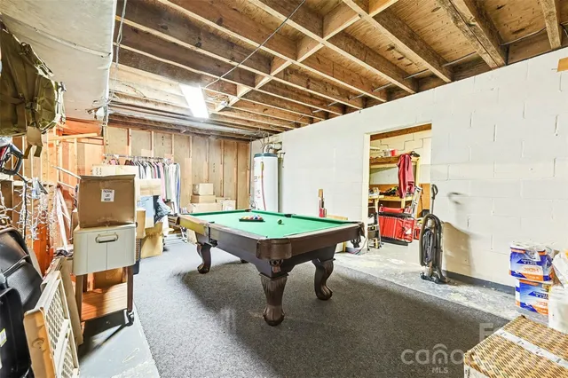 a room with furniture and a flat screen tv