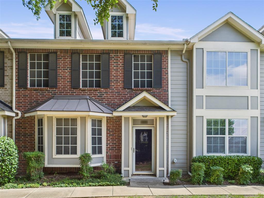 Multi unit property featuring brick siding