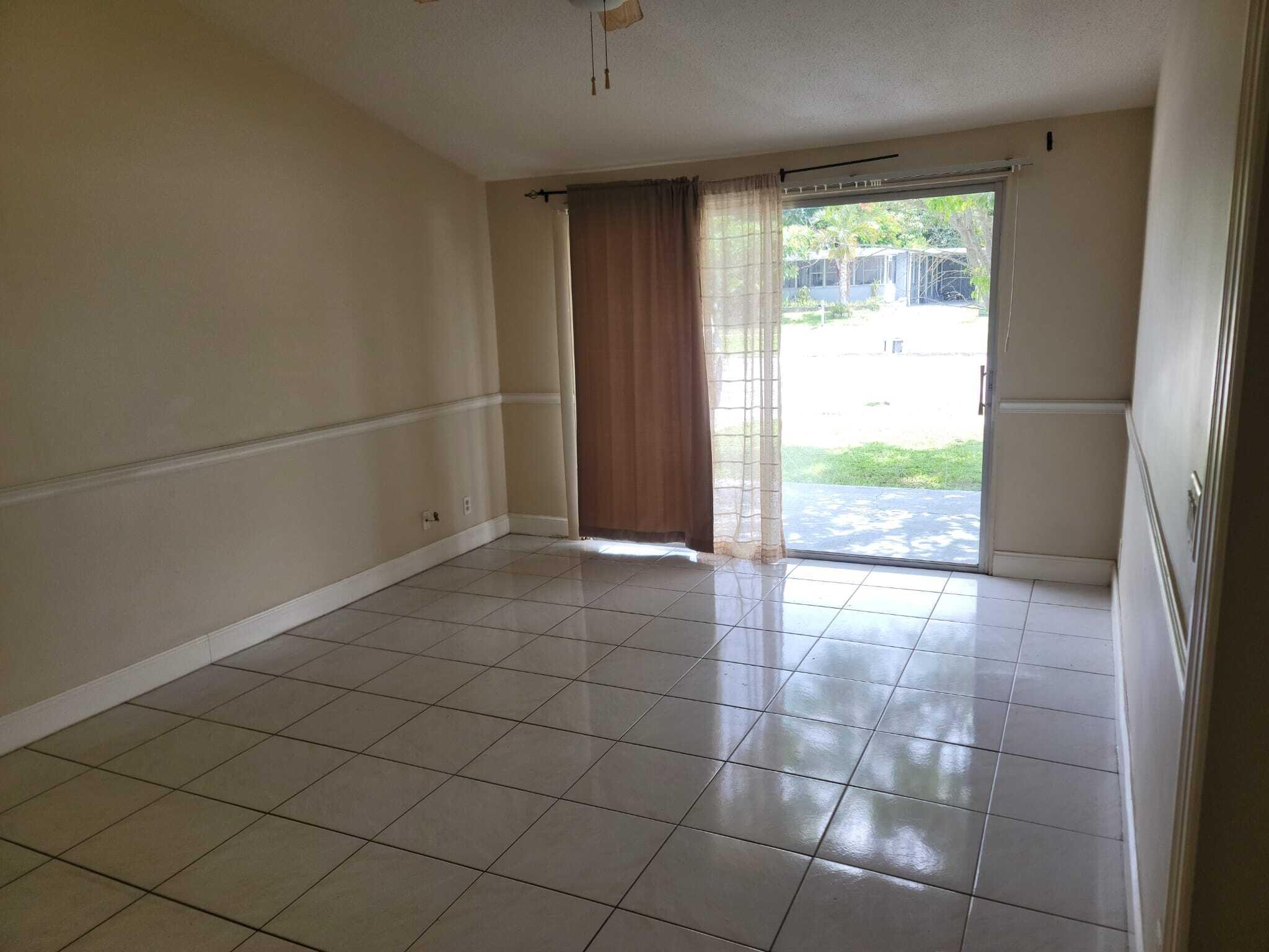 9783 Sandalfoot Boulevard Boca Raton, FL 33428 - Photo 7 of 11 Living Room