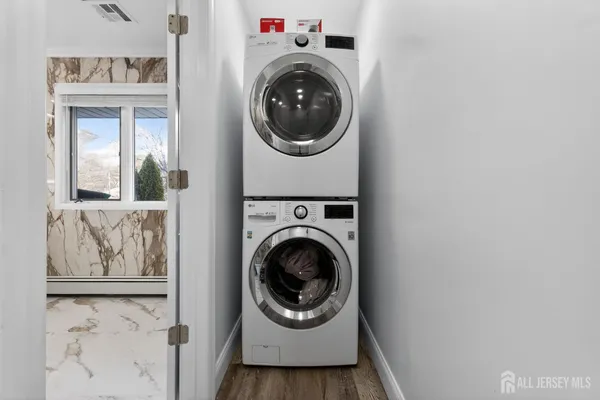 a utility room with dryer and washer