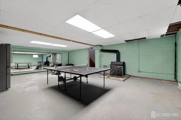 a living room with furniture and a table