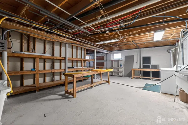 a view of an empty room with windows