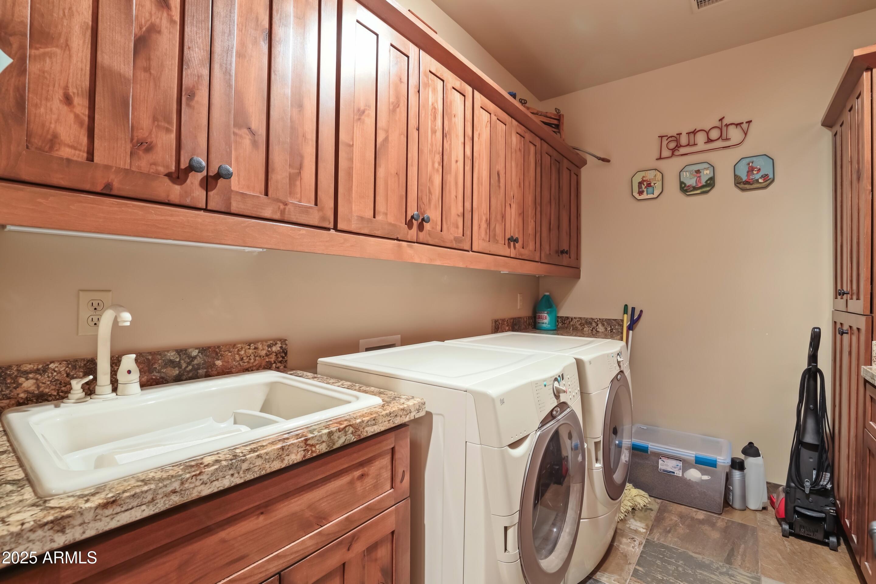 2307 East Grapevine Drive Payson, AZ 85541 - Photo 24 of 40 a utility room with dryer and washer