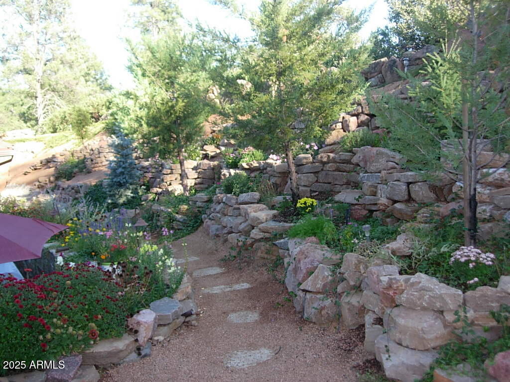 2307 East Grapevine Drive Payson, AZ 85541 - Photo 38 of 40 a view of a pathway with a yard