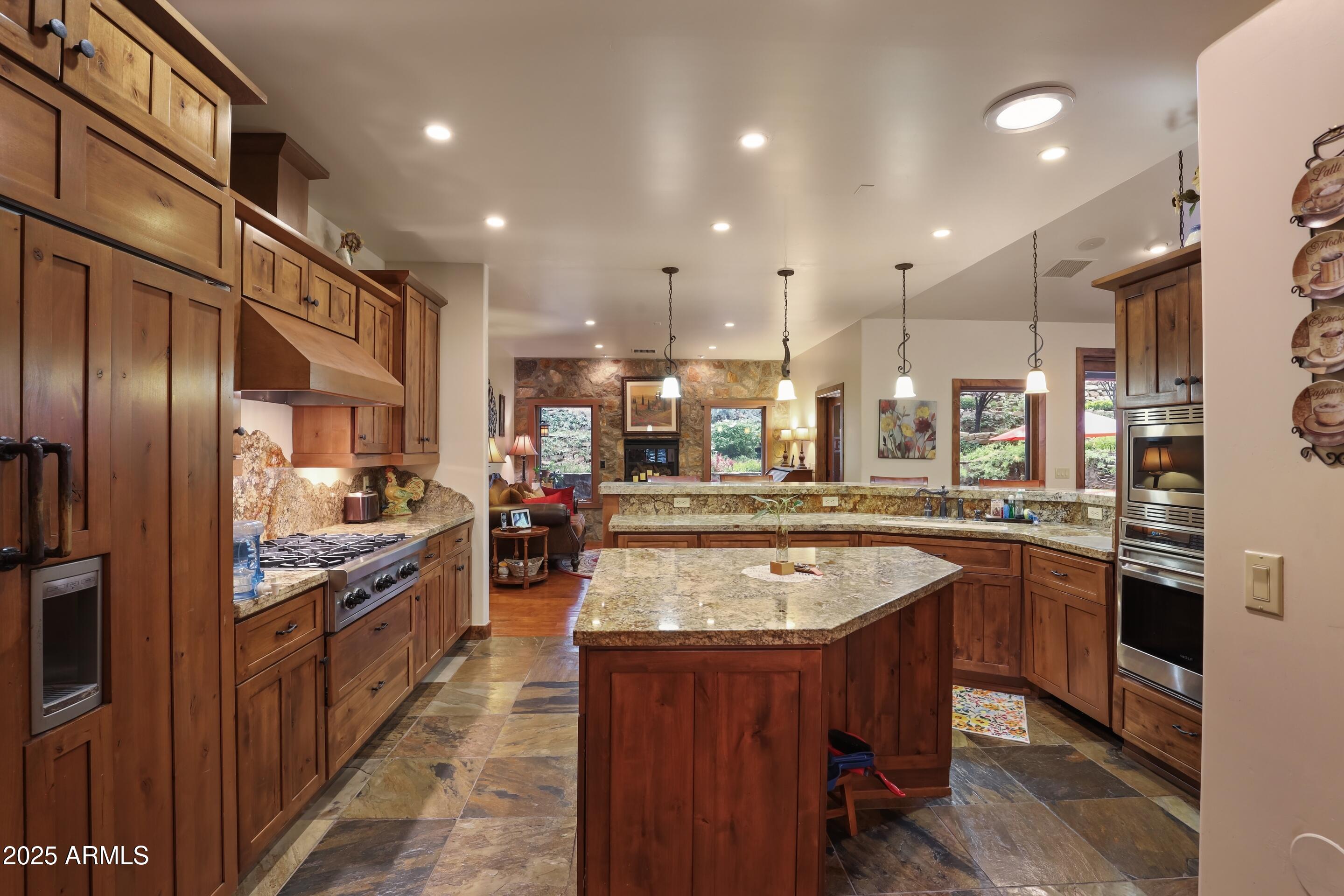 2307 East Grapevine Drive Payson, AZ 85541 - Photo 10 of 40 a large kitchen with stainless steel appliances granite countertop plenty wooden cabinets