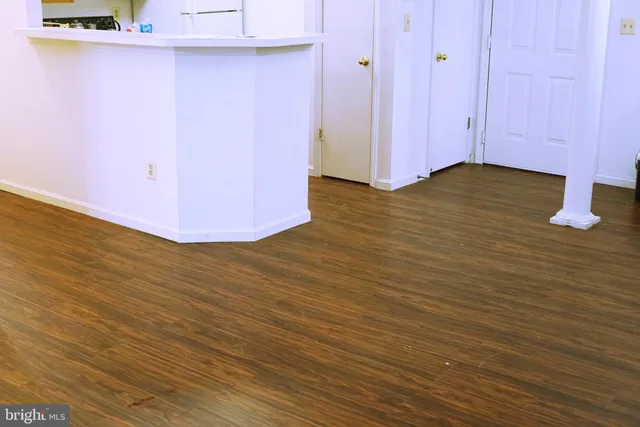 a balcony with table and chairs