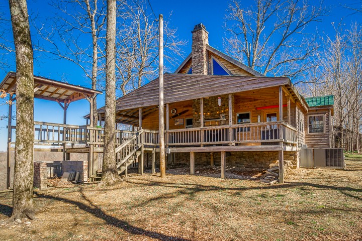 995 Dale Ridge Road Dowelltown, TN 37059 - Photo 1 of 45 a front view of a house with a yard
