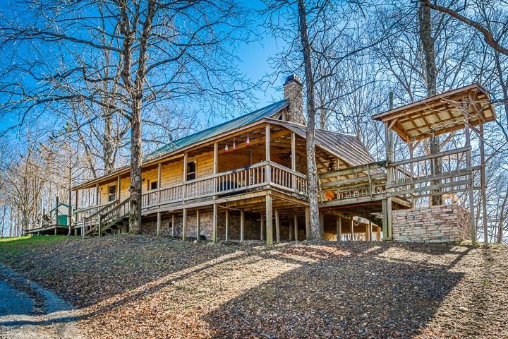 995 Dale Ridge Road Dowelltown, TN 37059 - Photo 3 of 45 a front view of a house with a yard