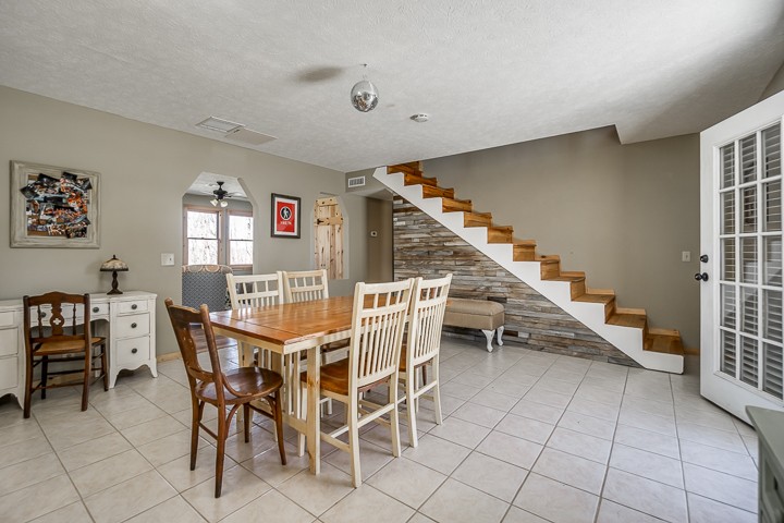 995 Dale Ridge Road Dowelltown, TN 37059 - Photo 24 of 45 a view of a dining room with furniture and a chandelier