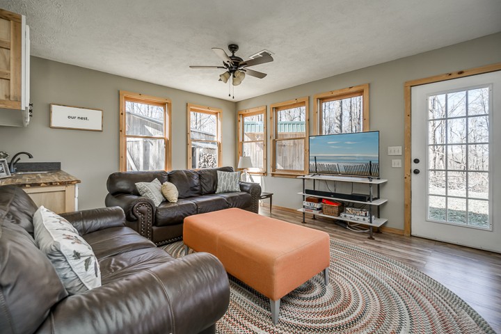 995 Dale Ridge Road Dowelltown, TN 37059 - Photo 30 of 45 a living room with furniture a flat screen tv and a window