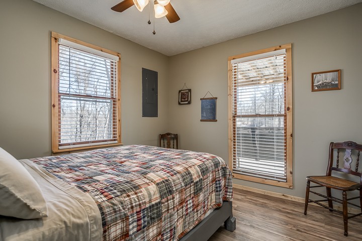 995 Dale Ridge Road Dowelltown, TN 37059 - Photo 34 of 45 a bedroom with a bed and a window