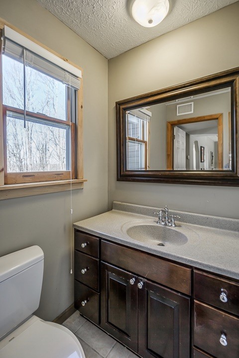 995 Dale Ridge Road Dowelltown, TN 37059 - Photo 35 of 45 a bathroom with a toilet sink and mirror