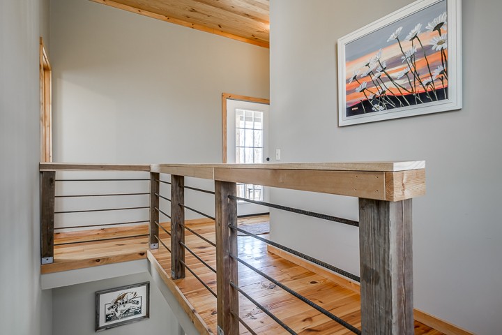 995 Dale Ridge Road Dowelltown, TN 37059 - Photo 36 of 45 a view of a hallway with paintings on the wall