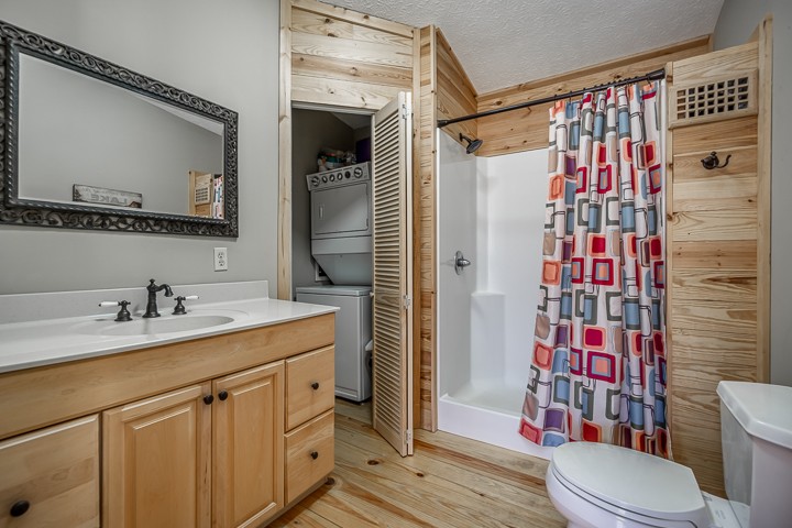 995 Dale Ridge Road Dowelltown, TN 37059 - Photo 39 of 45 a bathroom with a sink a toilet and shower