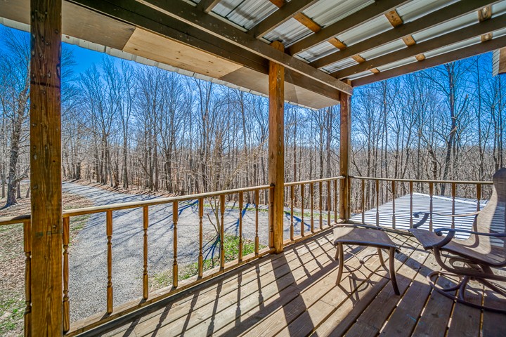995 Dale Ridge Road Dowelltown, TN 37059 - Photo 41 of 45 a view of balcony with a potted plant