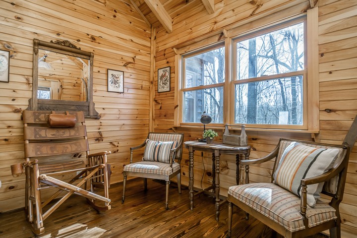 995 Dale Ridge Road Dowelltown, TN 37059 - Photo 7 of 45 a balcony with chairs and a table