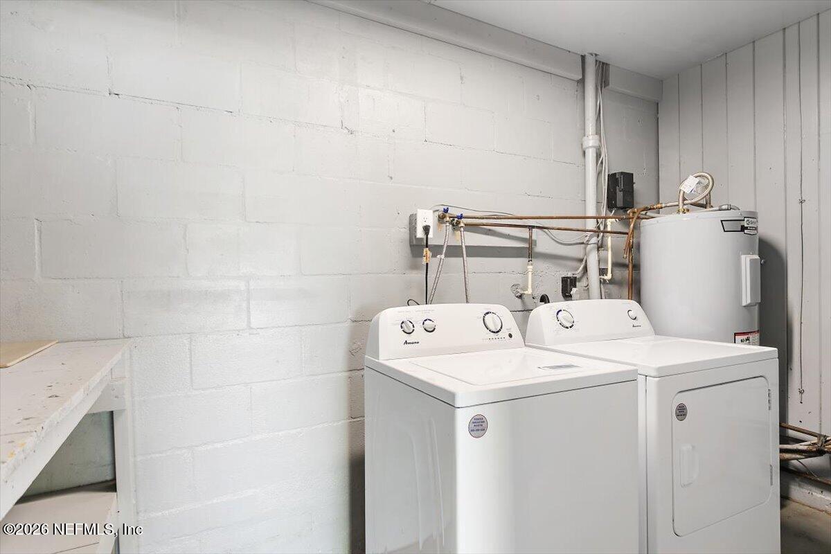 103 Coronado Street St. Augustine, FL 32080 - Photo 22 of 25 a utility room with dryer and washer