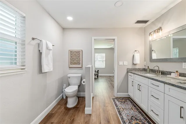 a view of a patio with couple of chairs in patio