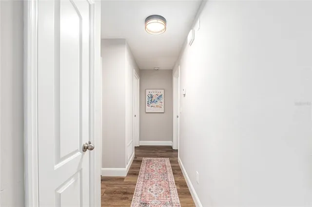 a view of a patio with couple of chairs