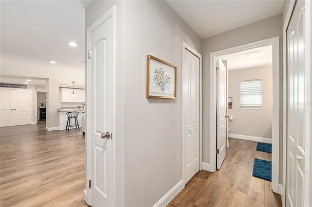 a house that has a big yard with large trees