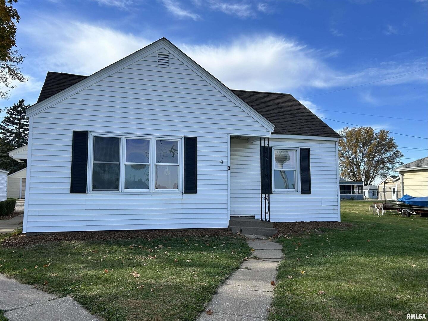 a brick house with a yard