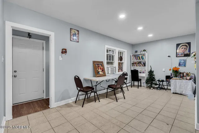 a view of a livingroom with furniture and dining room
