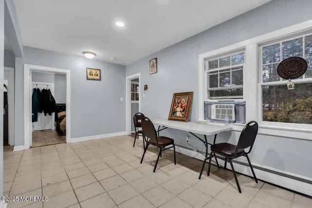 a workspace with furniture and window