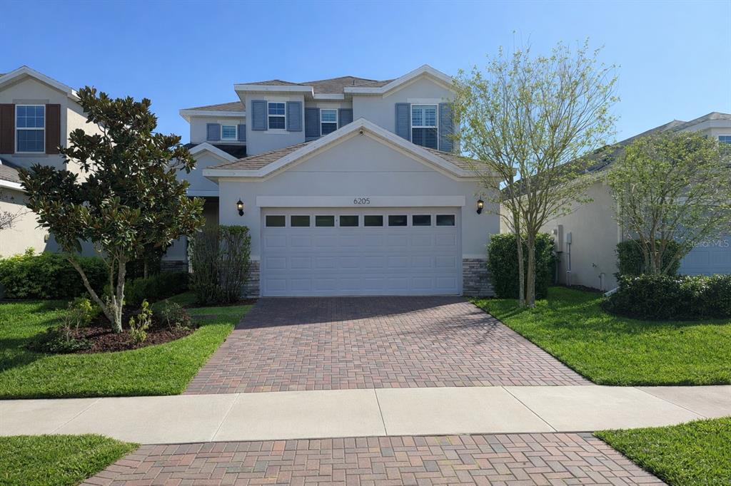 a view of house and outdoor space with yard