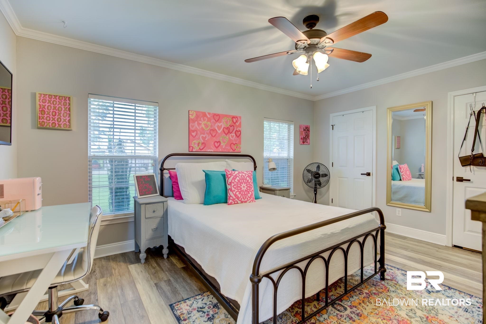 18732 Fairground Road Robertsdale, AL 36567 - Photo 27 of 46 Bedroom featuring crown molding, light wood-type flooring, and ceiling fan
