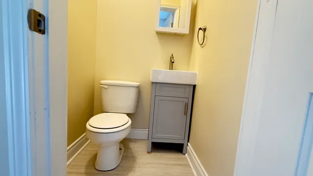 a bathroom with a sink and a toilet