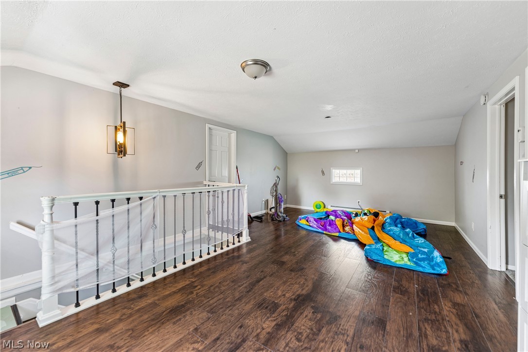 6711 Norwalk Road Medina, OH 44256 - Photo 25 of 46 Loft area with LVT flooring