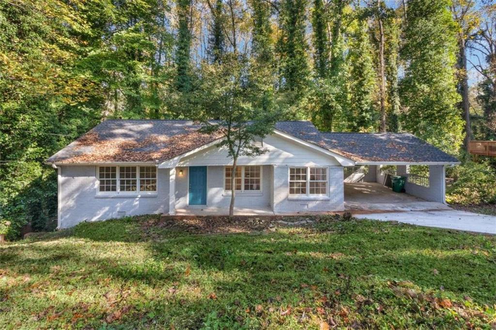 2372 Oakridge Court Decatur, GA 30032 - Photo 1 of 1 a front view of house with yard and green space