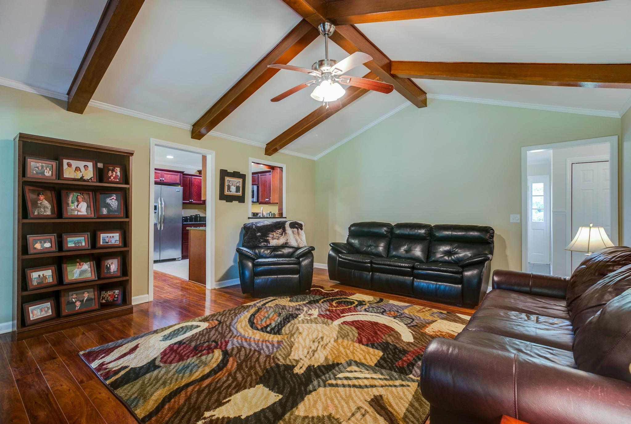 1649 Deerrun Road Murfreesboro, TN 37129 - Photo 18 of 28 a living room with furniture and a piano