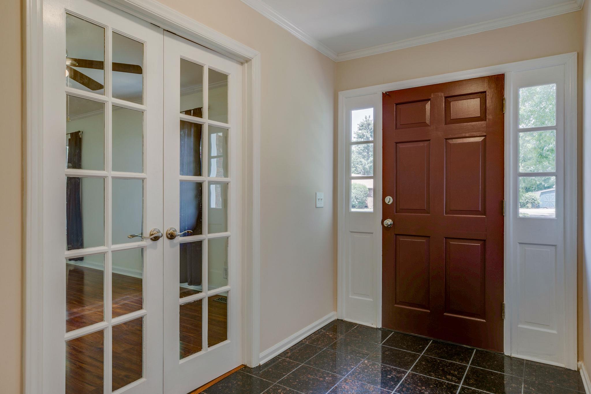 1649 Deerrun Road Murfreesboro, TN 37129 - Photo 5 of 28 a view of an empty room with wooden floor and closet