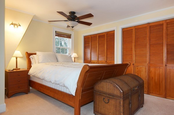 19 Highland Road Belmont, MA 02478 - Photo 14 of 30 a bedroom with a bed and window