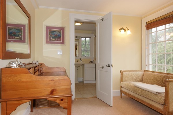 19 Highland Road Belmont, MA 02478 - Photo 15 of 30 a bedroom with a bed and wooden floor