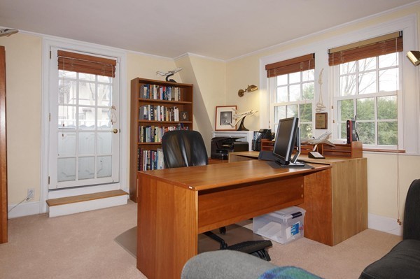 19 Highland Road Belmont, MA 02478 - Photo 19 of 30 a view of a workspace with furniture and a window